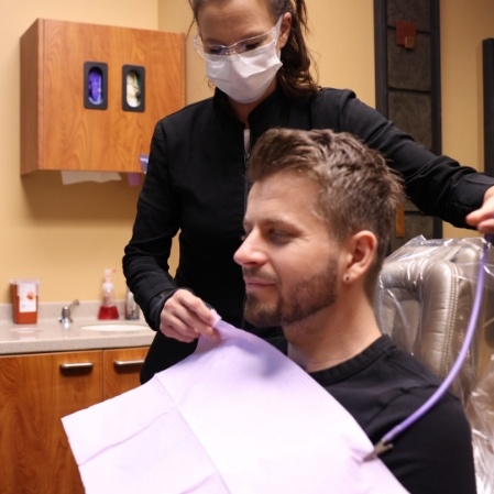 Dental patient receiving oral cancer screening